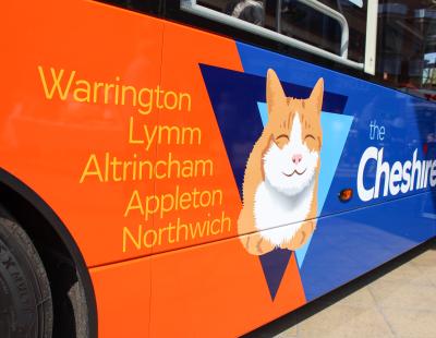 Close up image of the side of Warrington's Own Buses' Warrington to Lymm and Altrincham service.